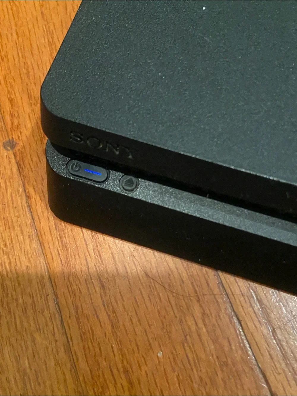 Sony Black PlayStation Slim Console with white Controller (back is missing)
